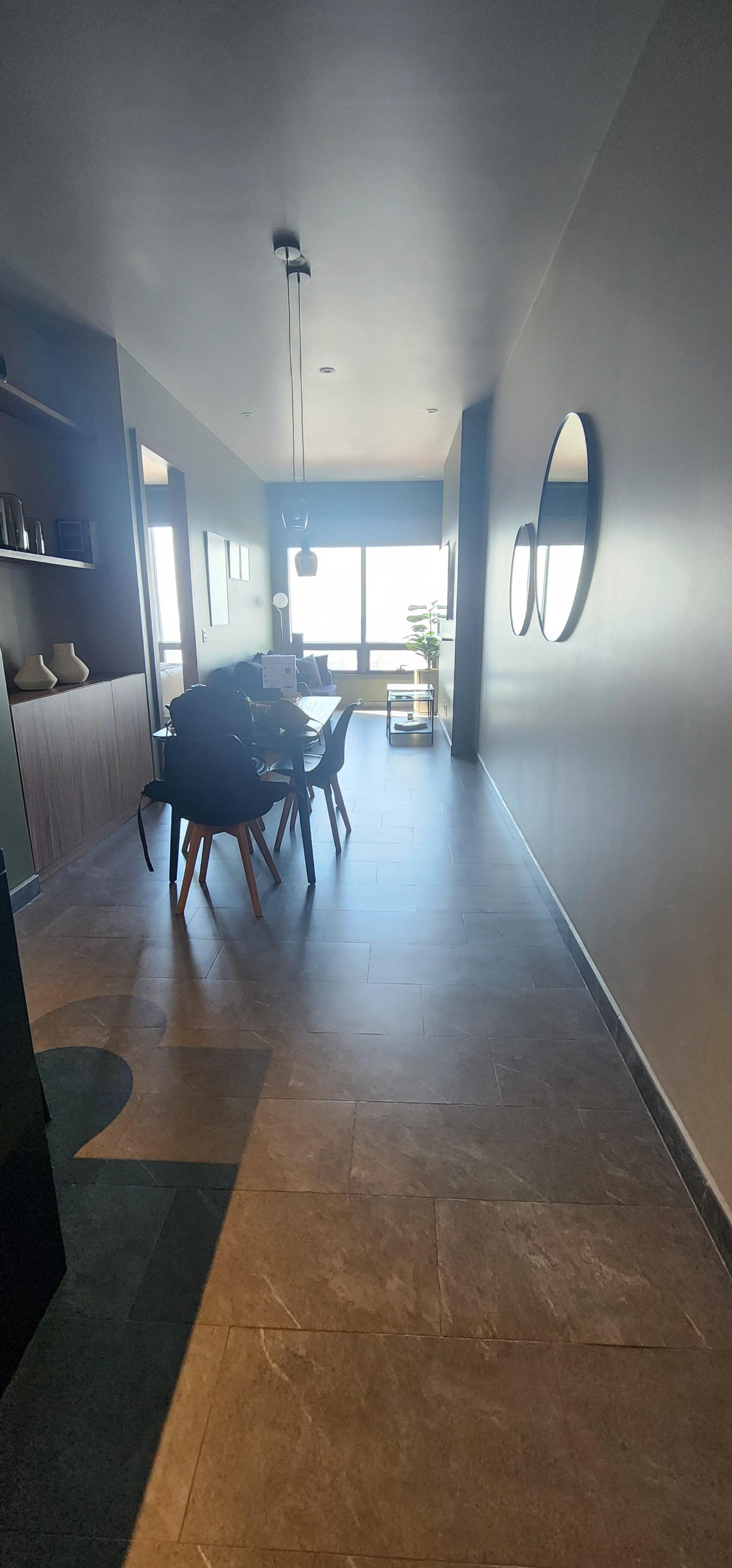 The living room and kitchen.