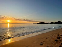 Sunrise on the beach directly across from Accommodation.