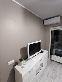55 in TV lol and cracked wall