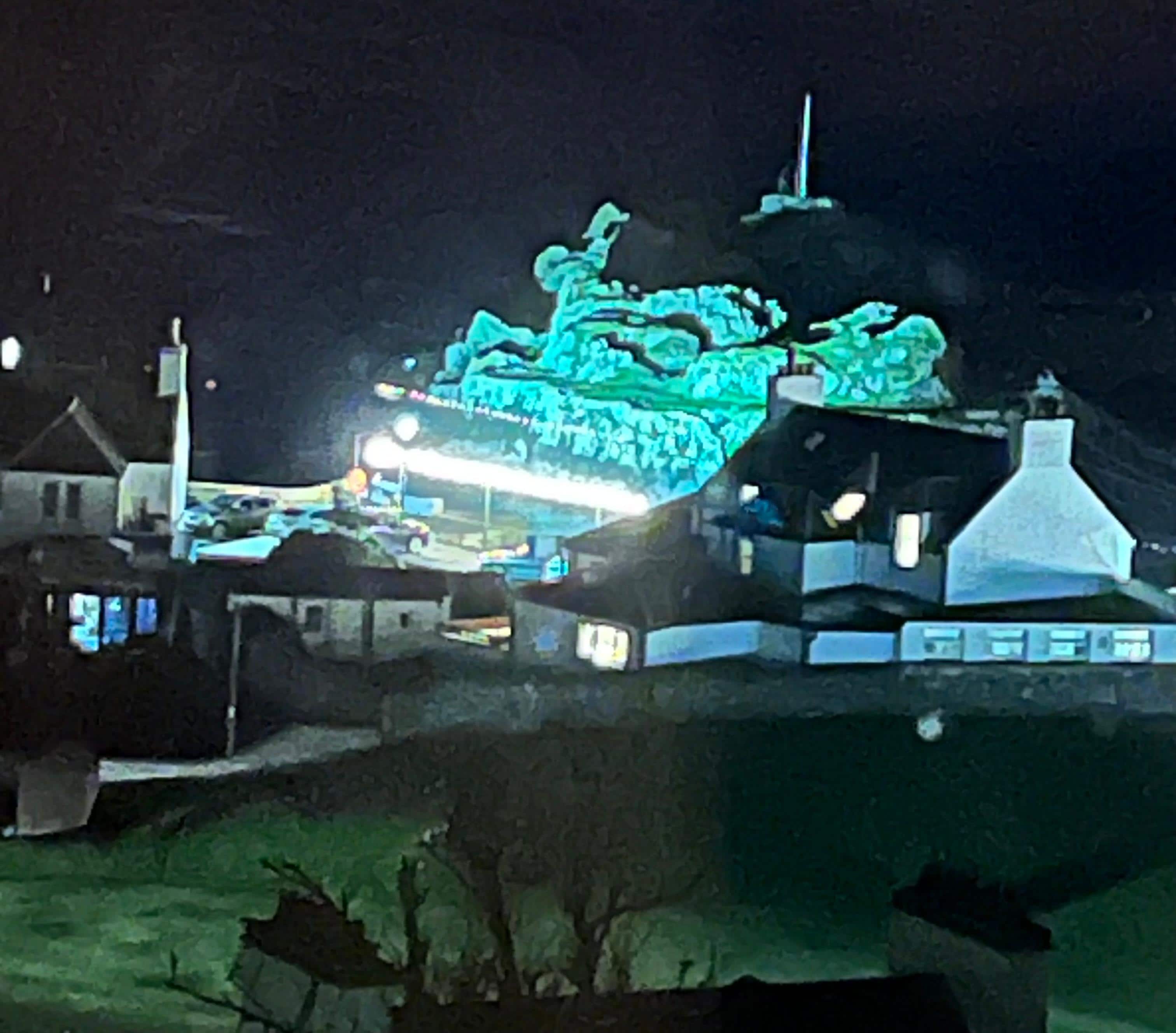 Night view of illuminated harbour. 
