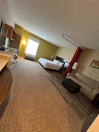 We loved the room set up with a pull out couch, large screen TV, and pull up table.