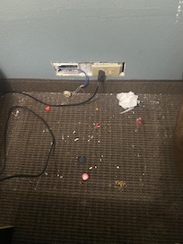 Behind/under nightstand
