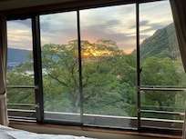 This was the view of daybreak from my room’s large window right alongside the beds.