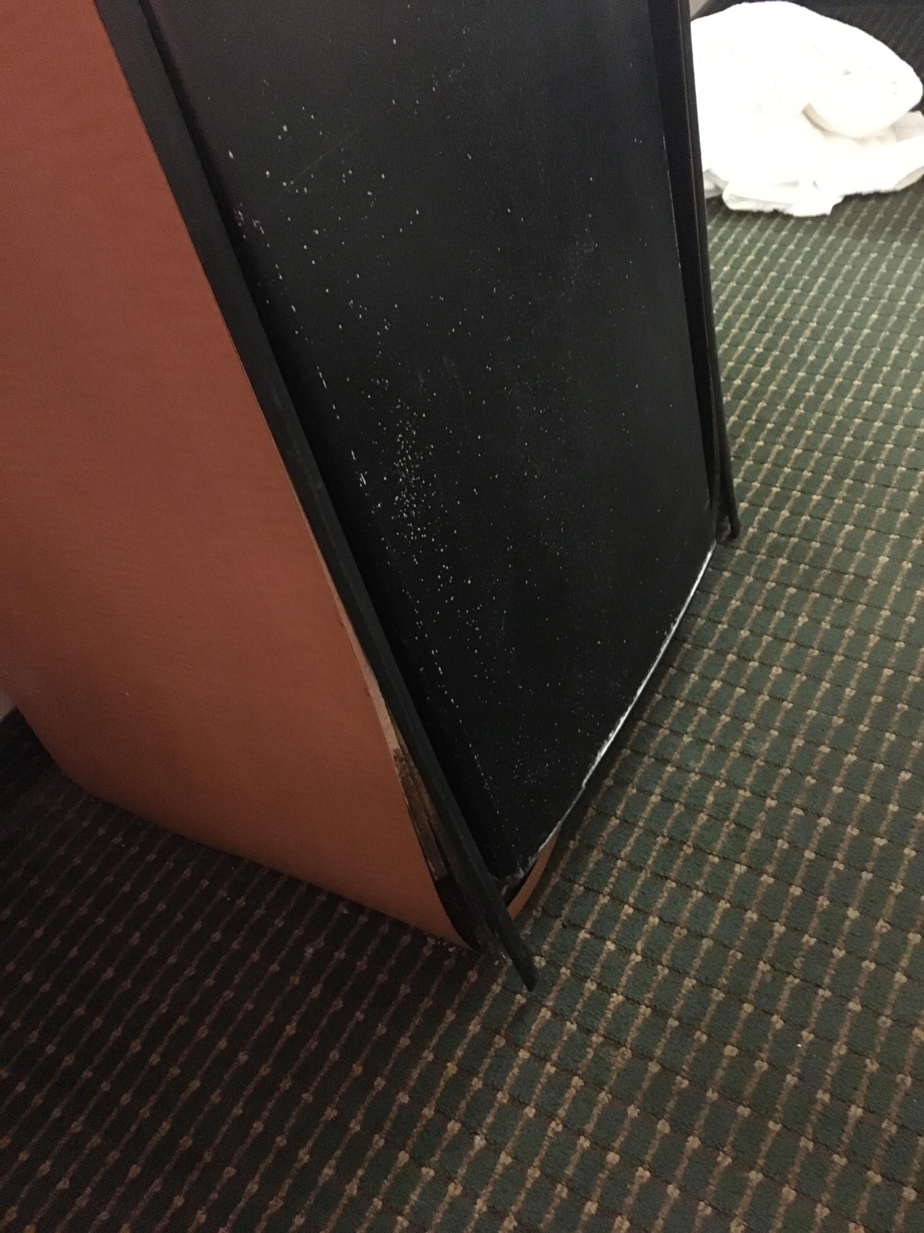Broken leaking refrigerator