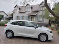 Our car in the parking area in front of the guest house.