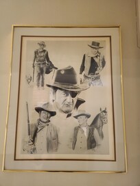 John Wayne image on wall