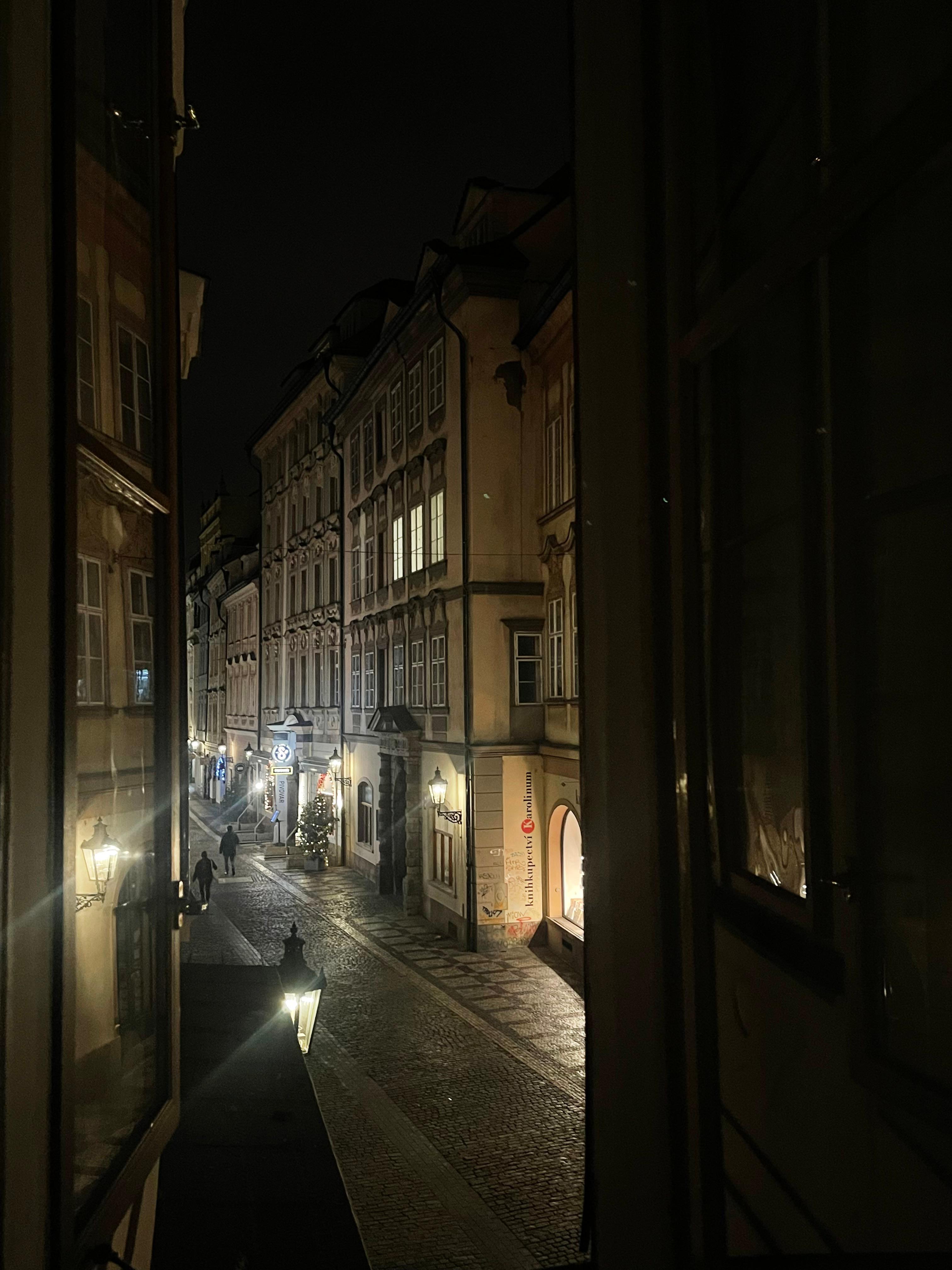 Nighttime view from the enclosed balcony window.