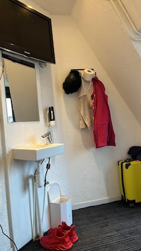 Room 303 on the third floor, bust telephone dangerously unsafe because of the electrical wiring