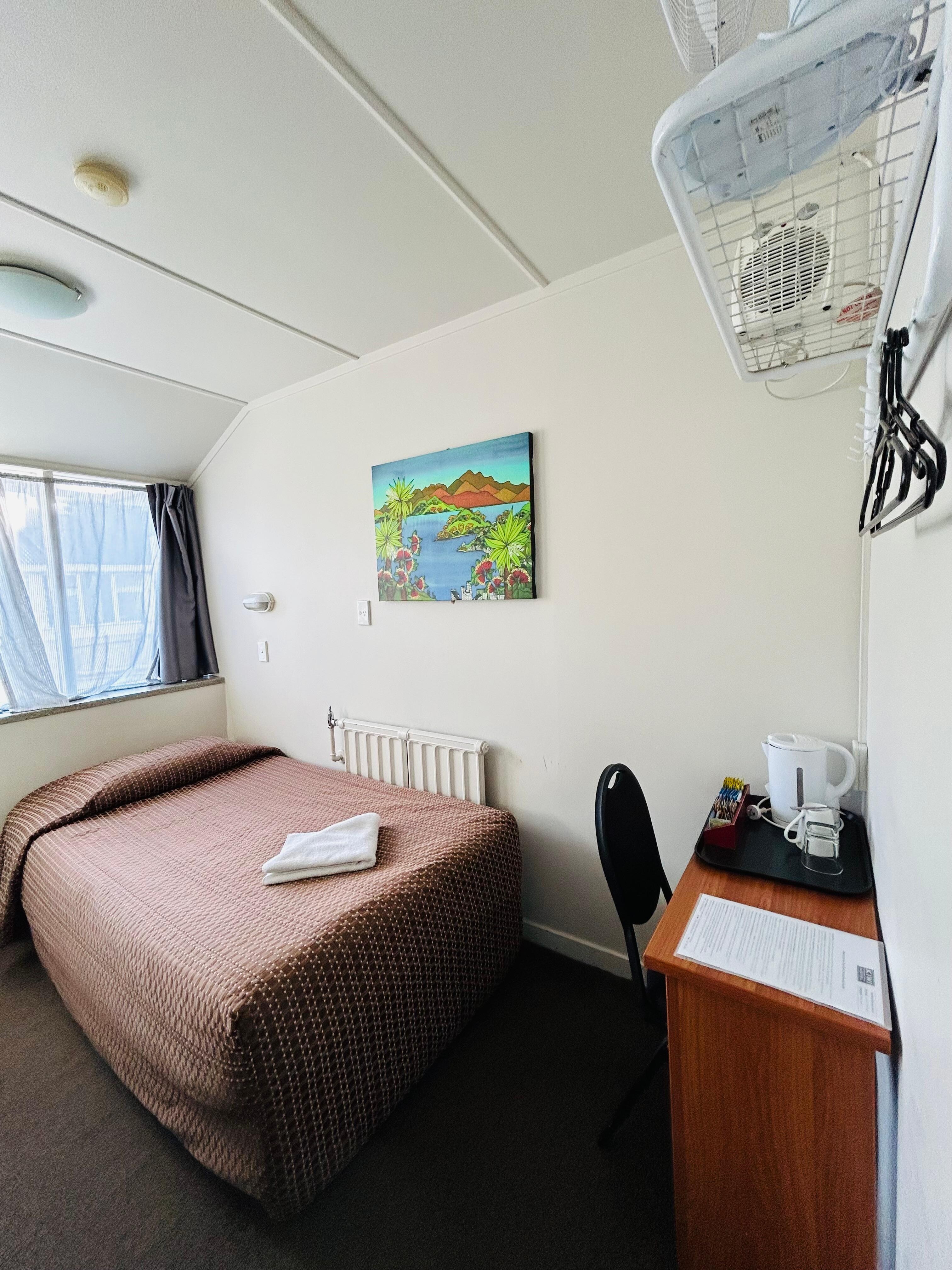 It's a simple but comfortable room. I like the pictures on the walls.