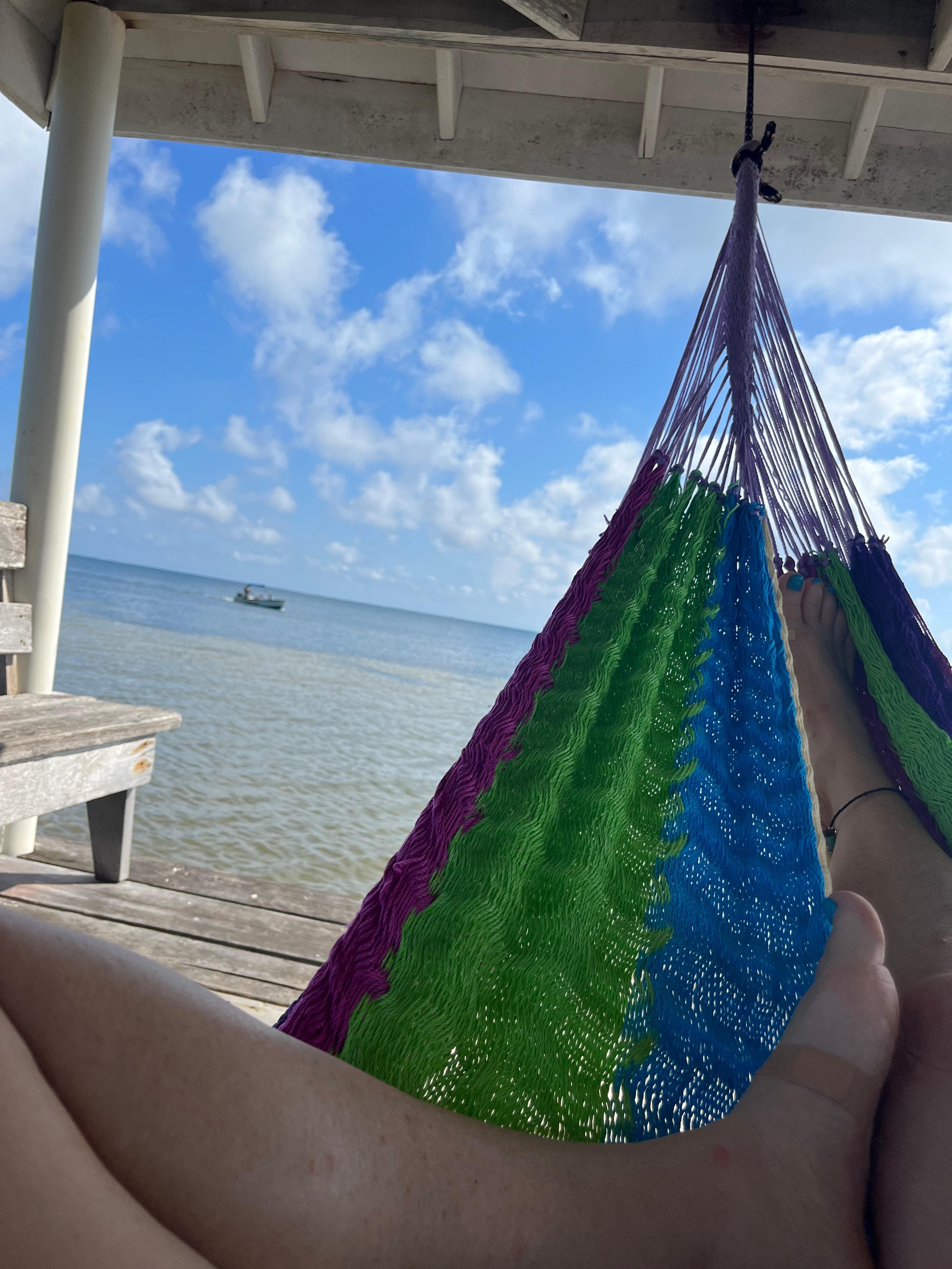 Relaxing on dock in hammock