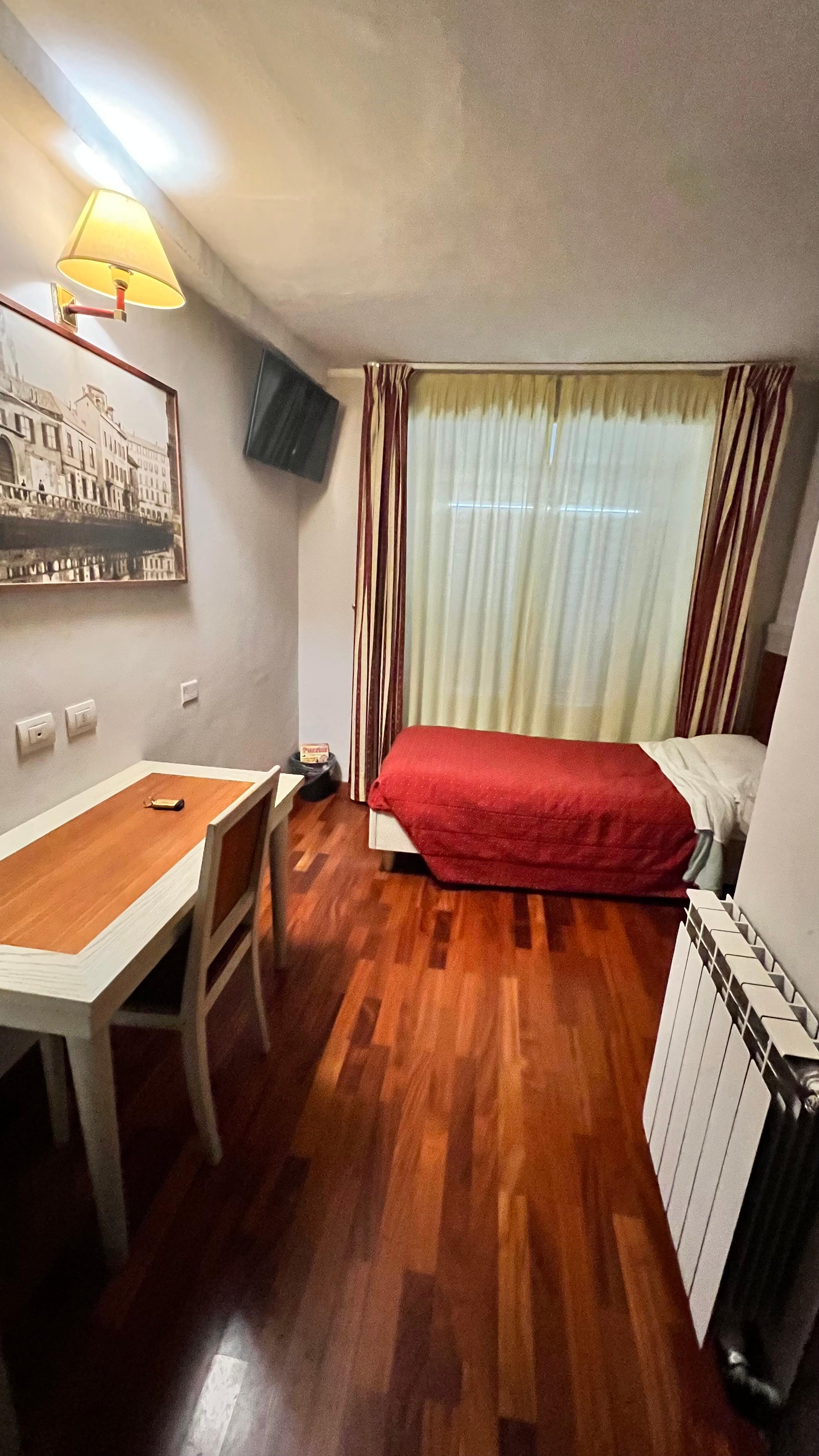 Single room, comfy bed, but pretty small. Safe and fridge on the room. 
