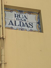 Look for yellow building at corner down behind Cathedral. Turn right to find apartment door a few doors down.