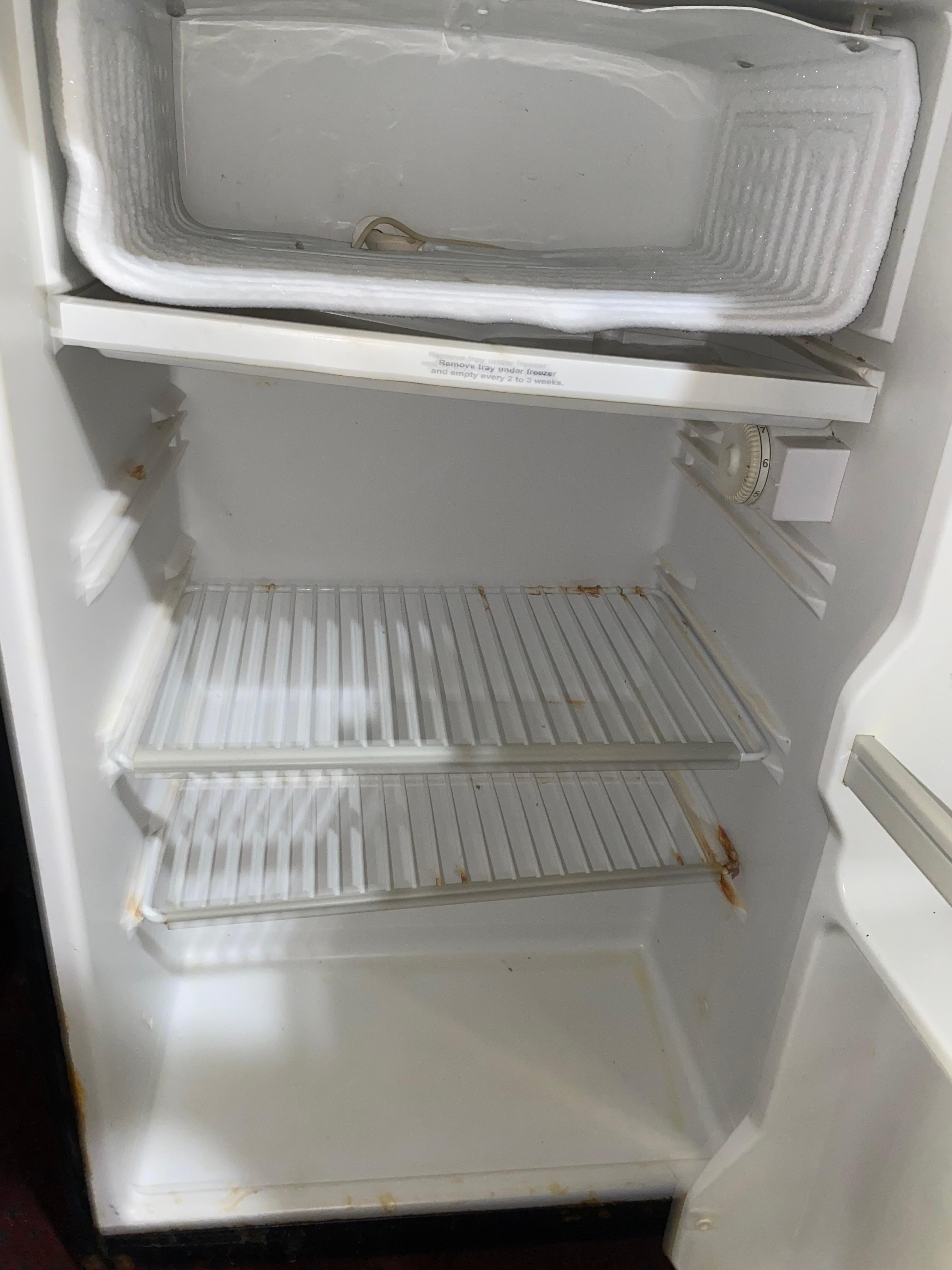 Moldy and rusted fridge 