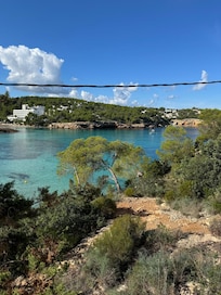The bay at El Arenal beach in Portinatx