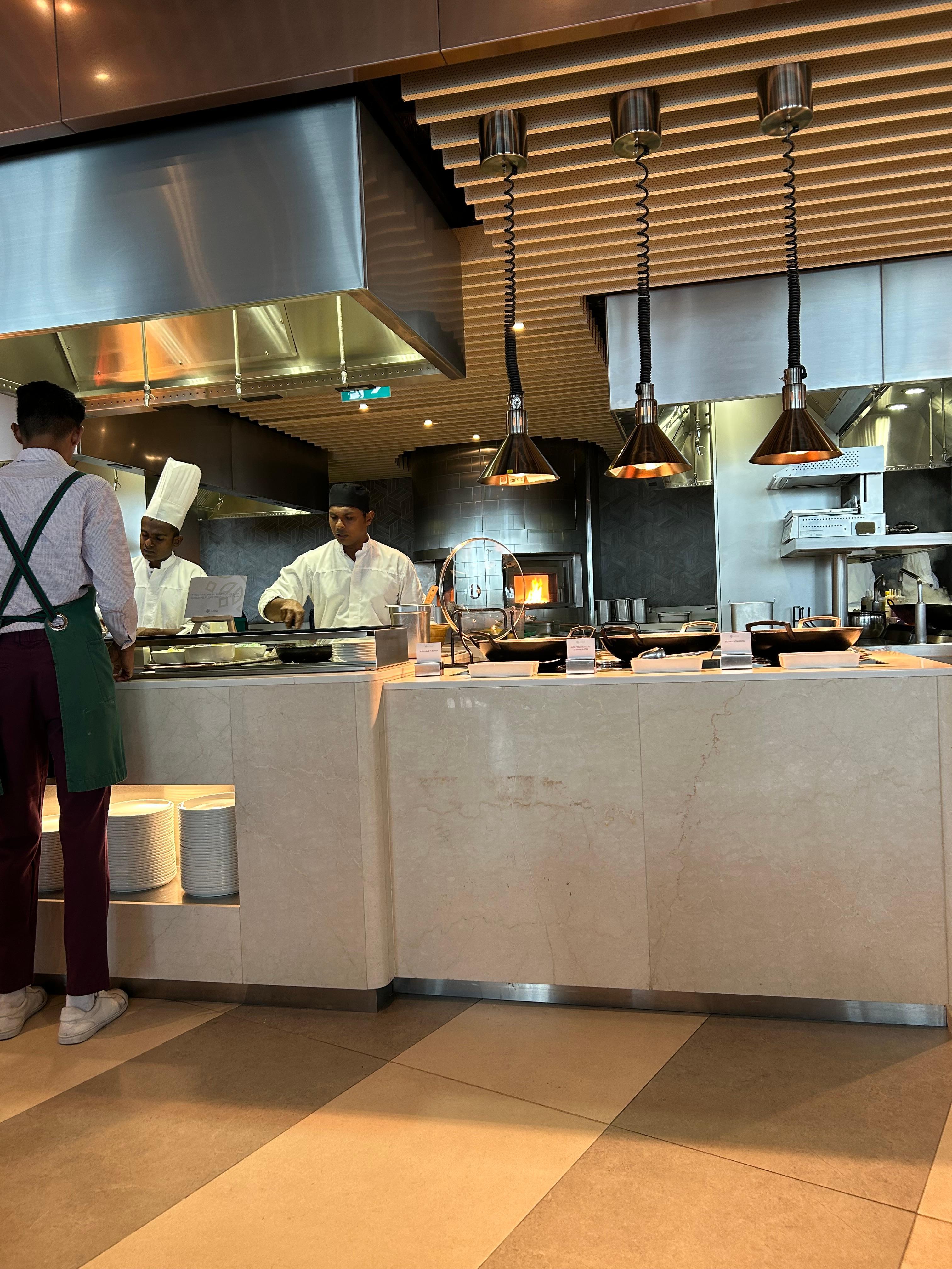 Chefs preparing food in restaurant 