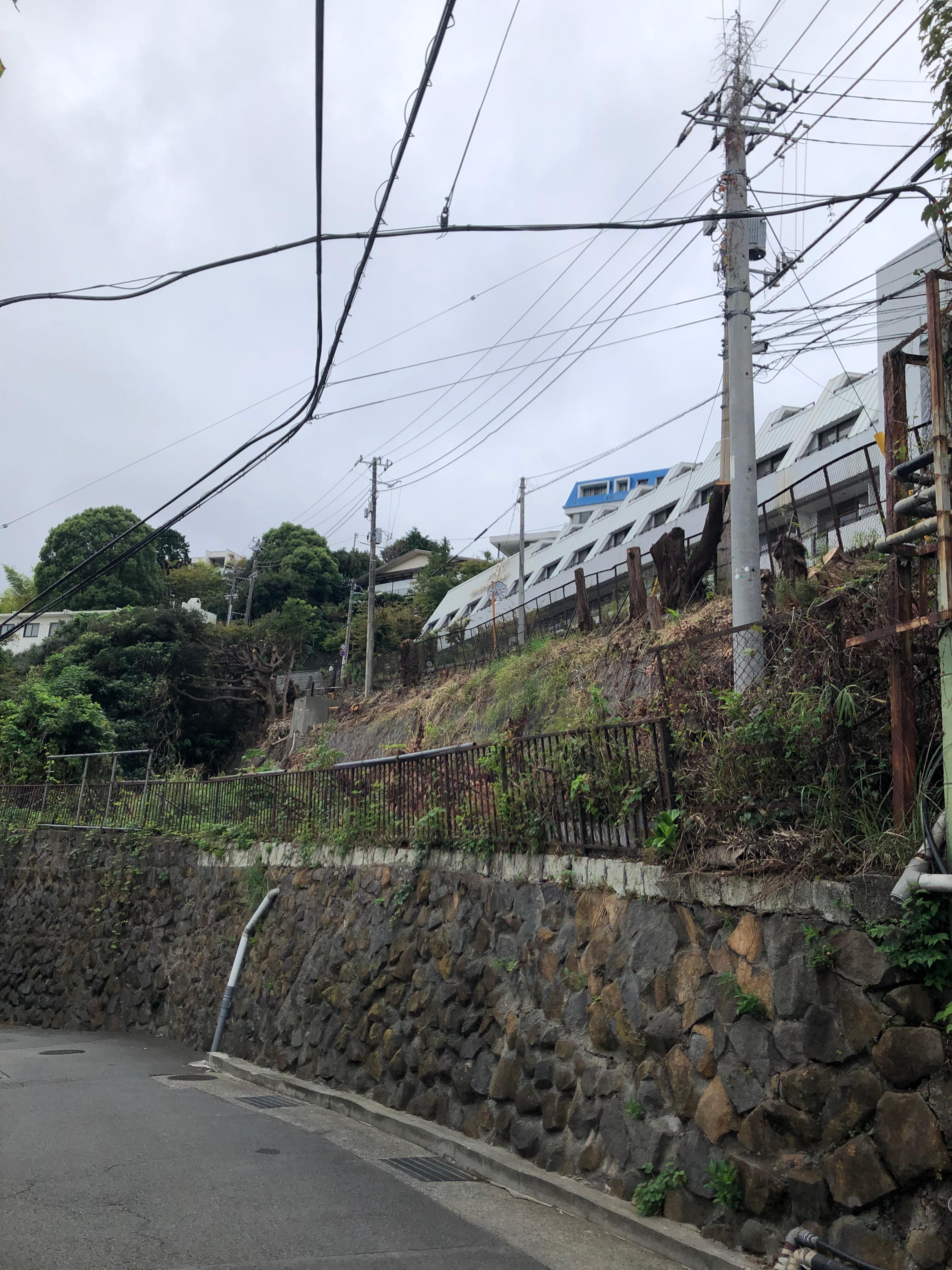 The white building is the hotel on the hill.