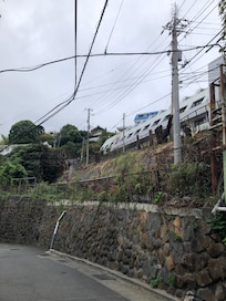 The white building is the hotel on the hill.