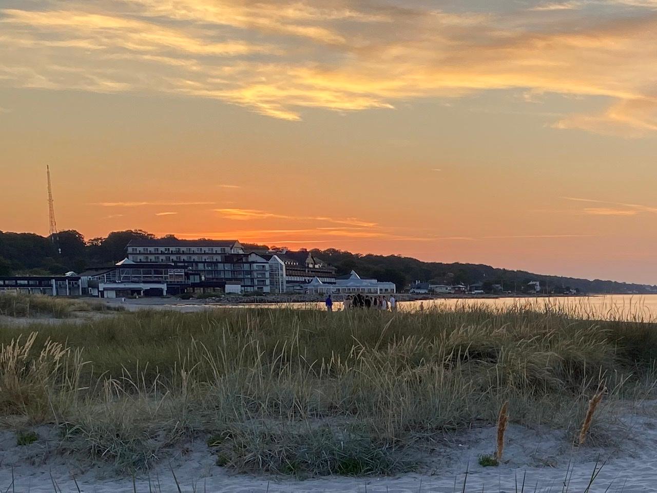 Sunset behind the hotel. View from the nearby harbour.