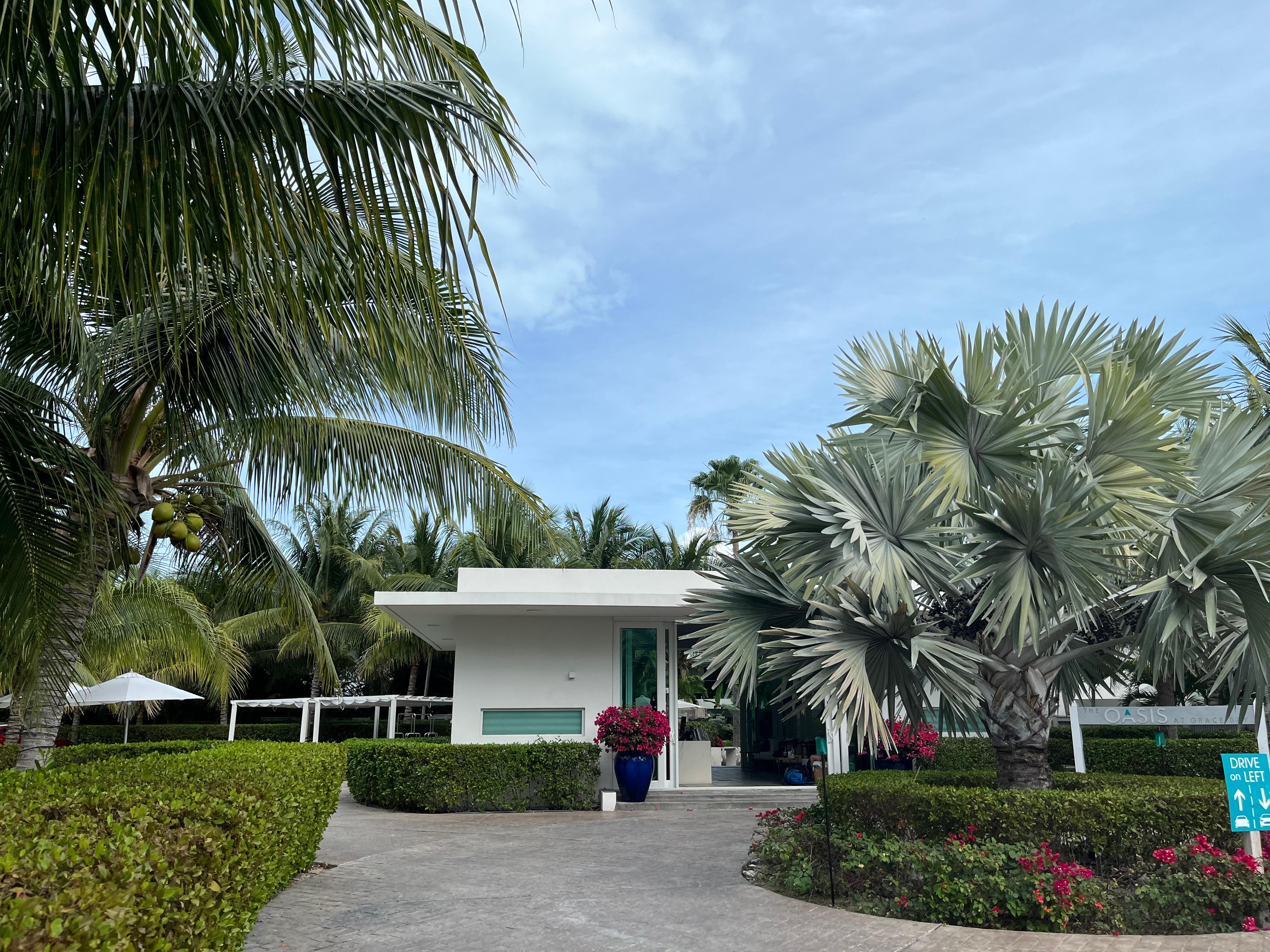 The outdoor front desk area, which is between security and the rooms/villas. 