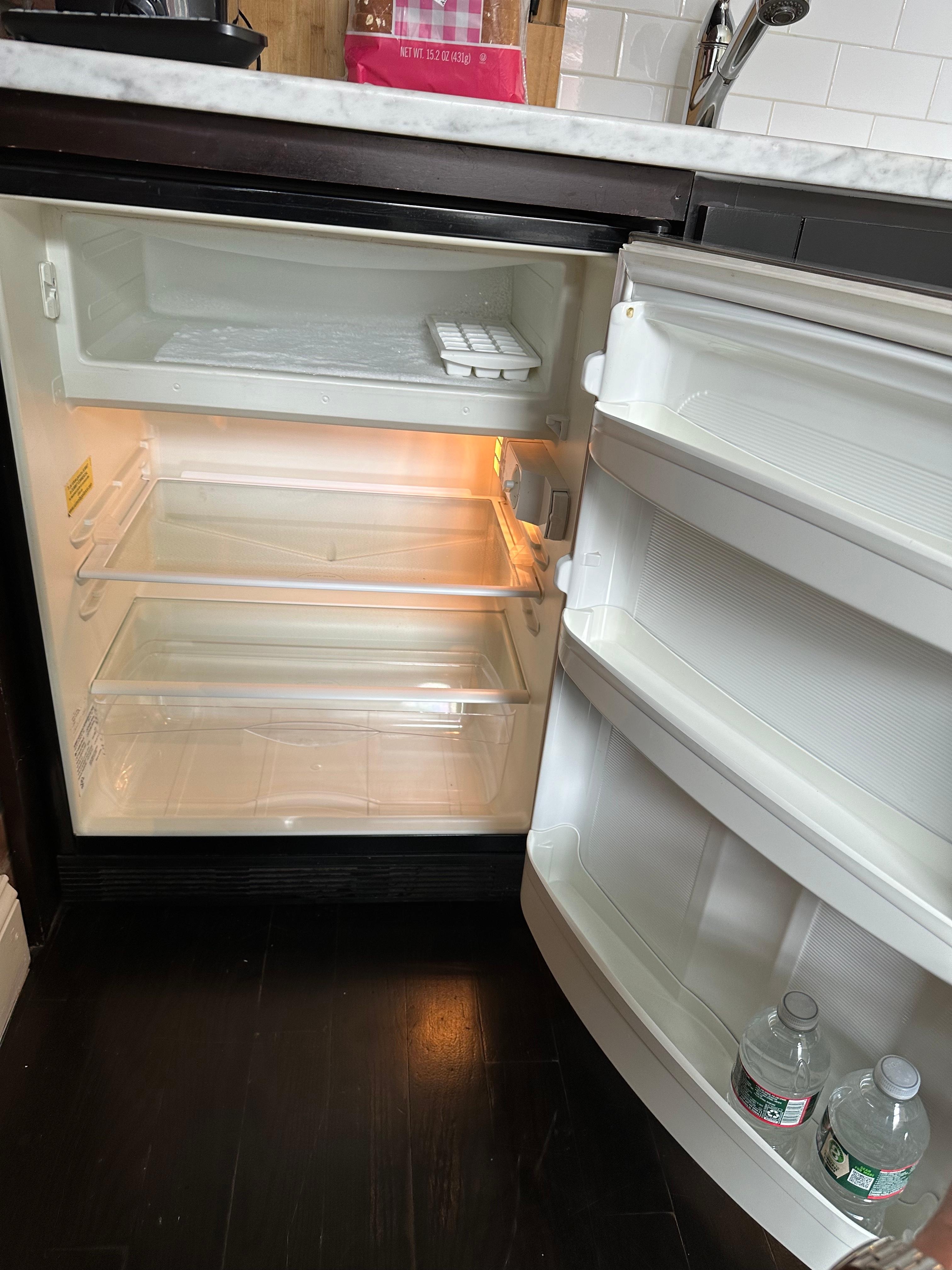 Damaged refrigerator:
Missing door to the freezer compartment, which causes the food there to melt
