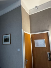 The door to the tiny bathroom