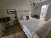 King bed, 2 bag holders in the room.