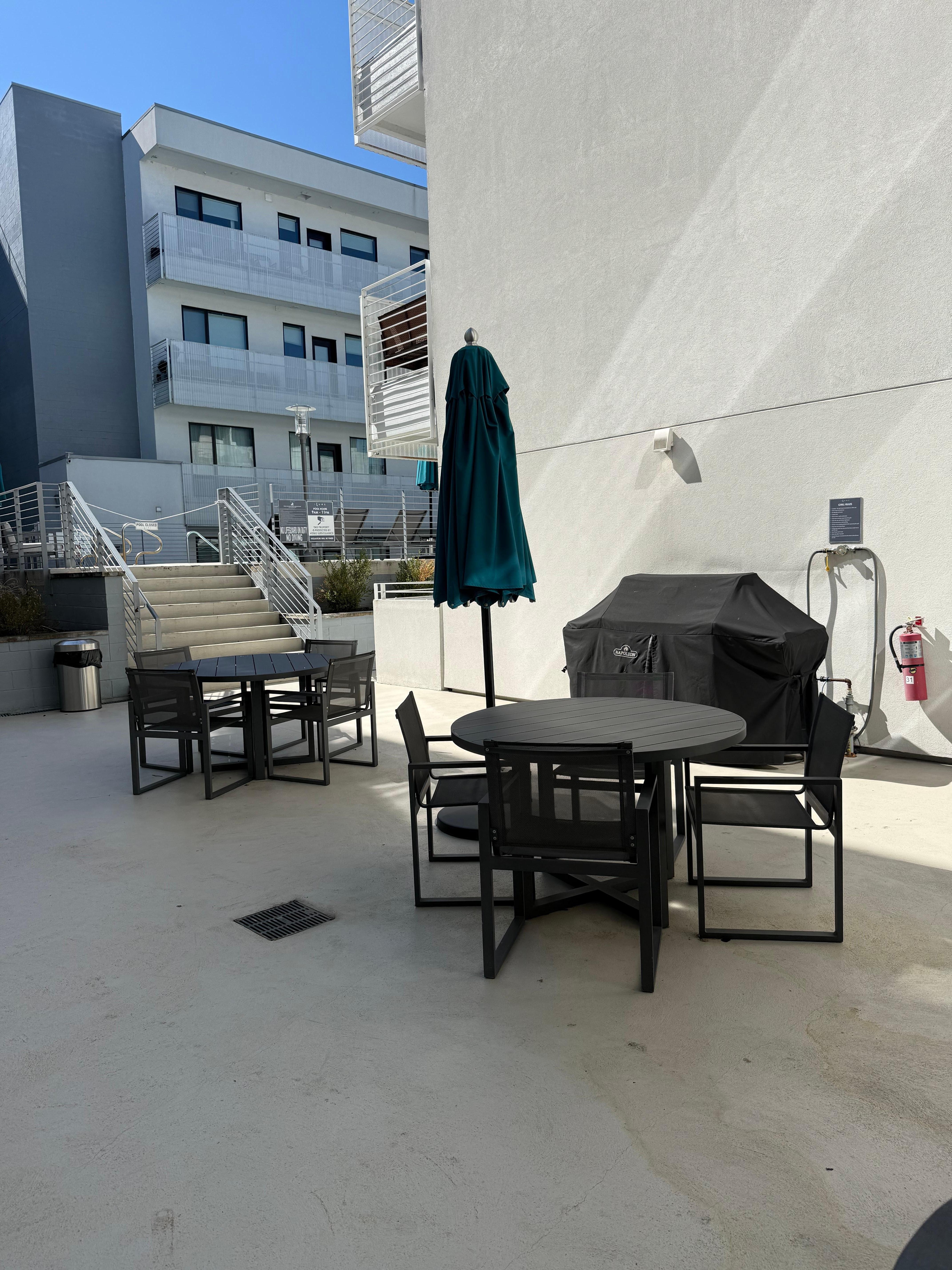 Grill area right next to the condo very convenient 