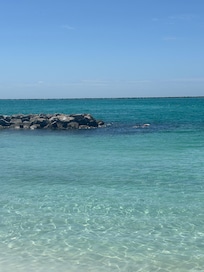 Snorkeling around rocks or fishing.