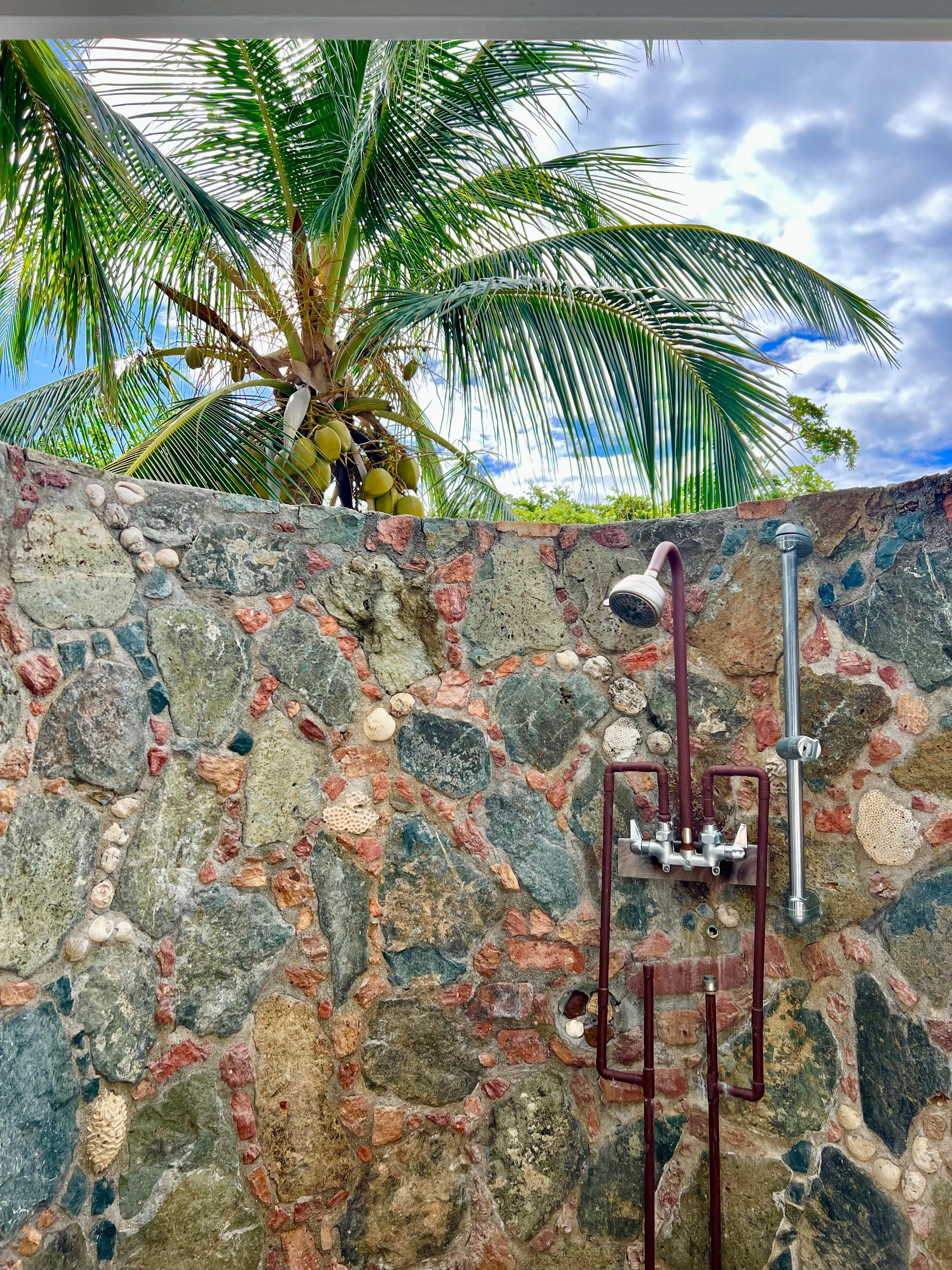 Outdoor shower in primary king bedroom
