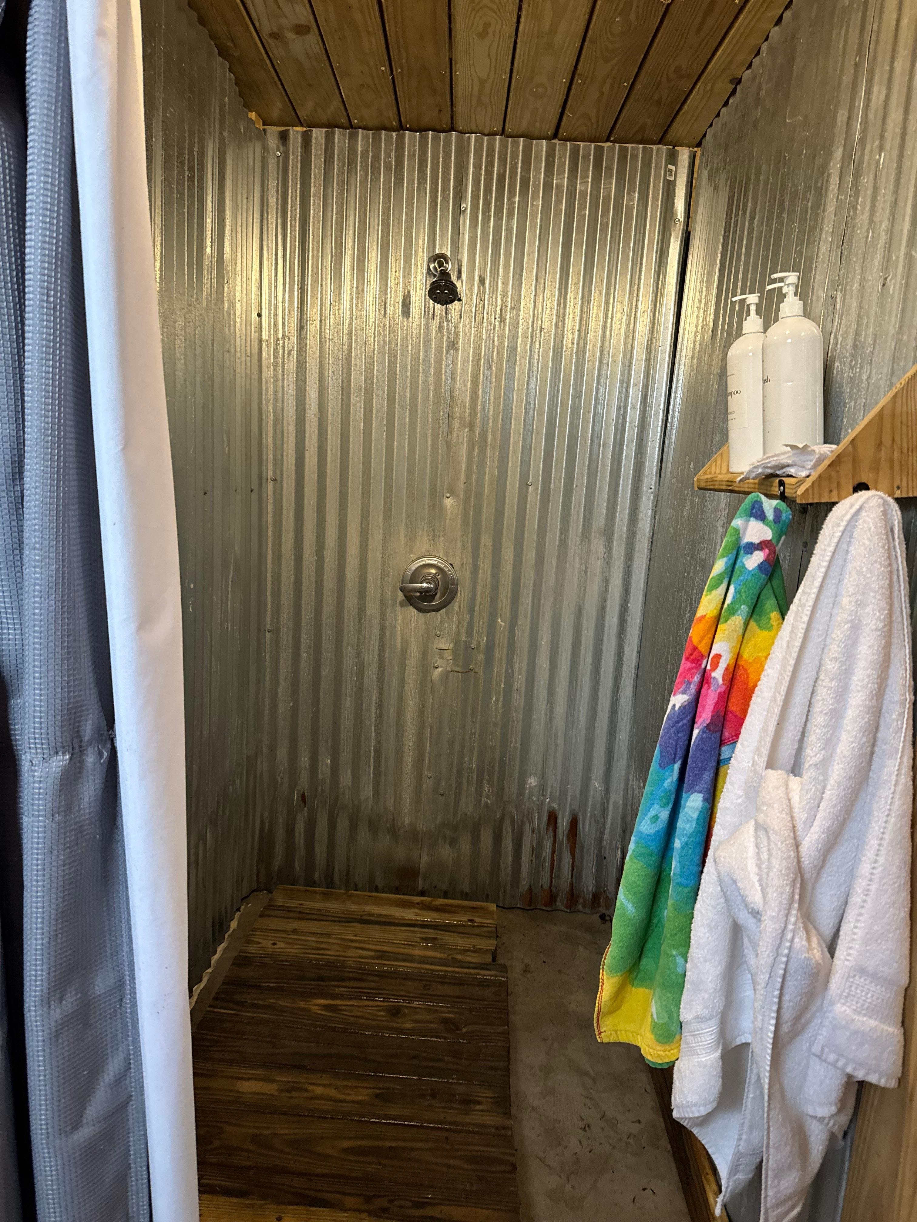 Showers located in the barn. 