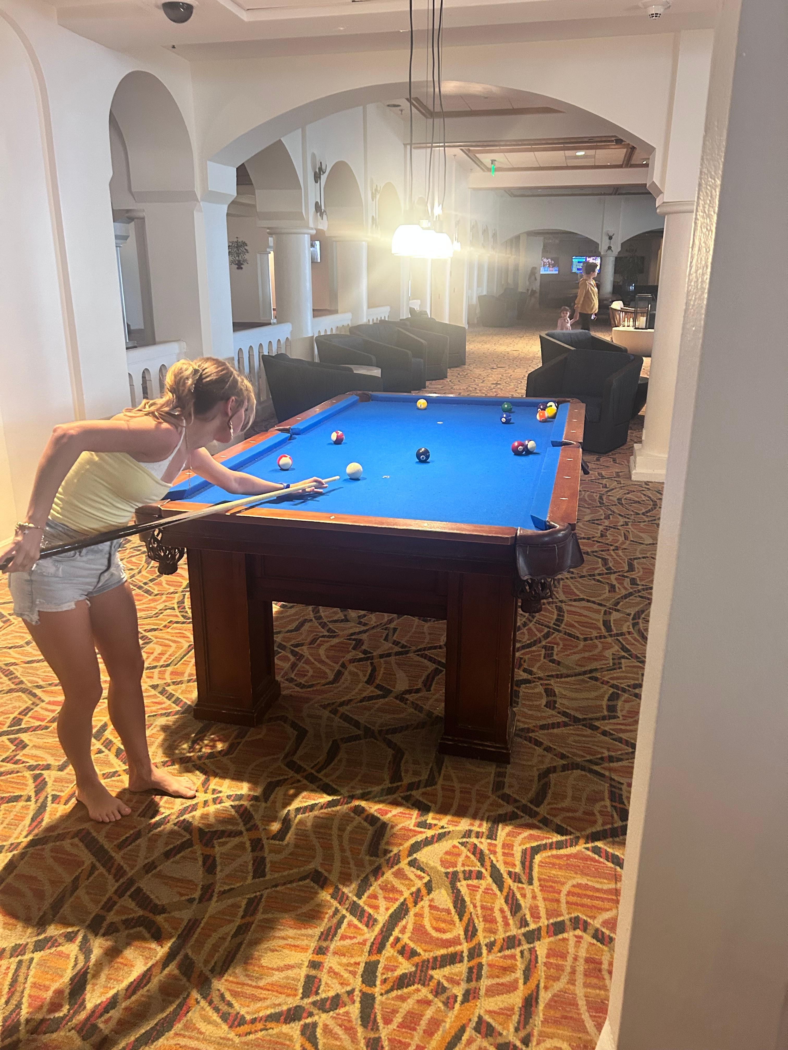 The 21 club had an area for families to hang out in the evenings. The teens enjoyed the pool tables.