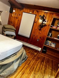 One of the bedrooms, after we stripped bedding to depart