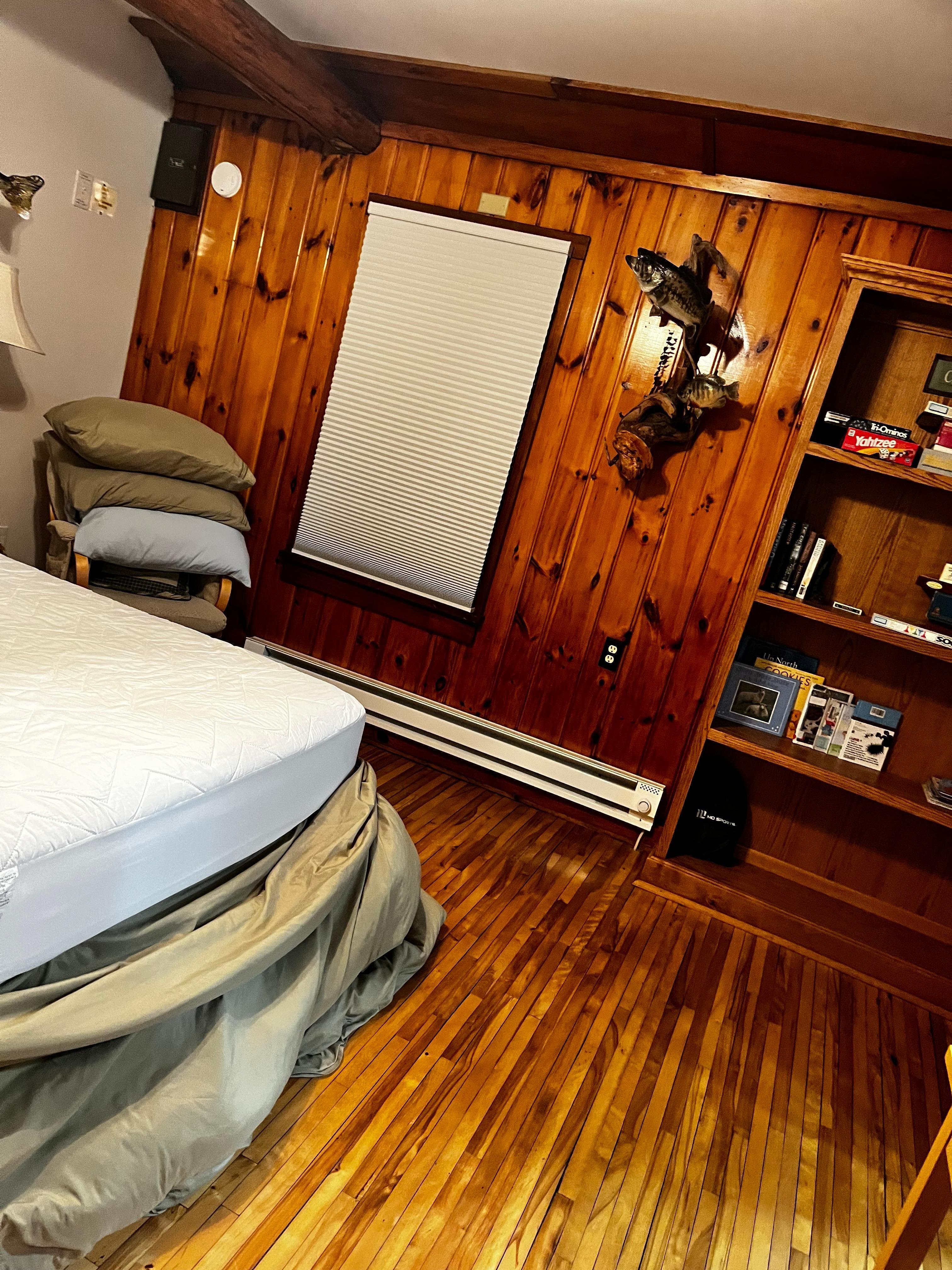 One of the bedrooms, after we stripped bedding to depart