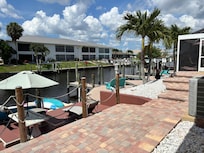 Back of property w outdoor water amenities