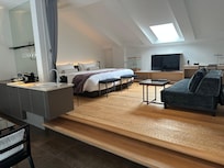 The bed can hold a dozen people.