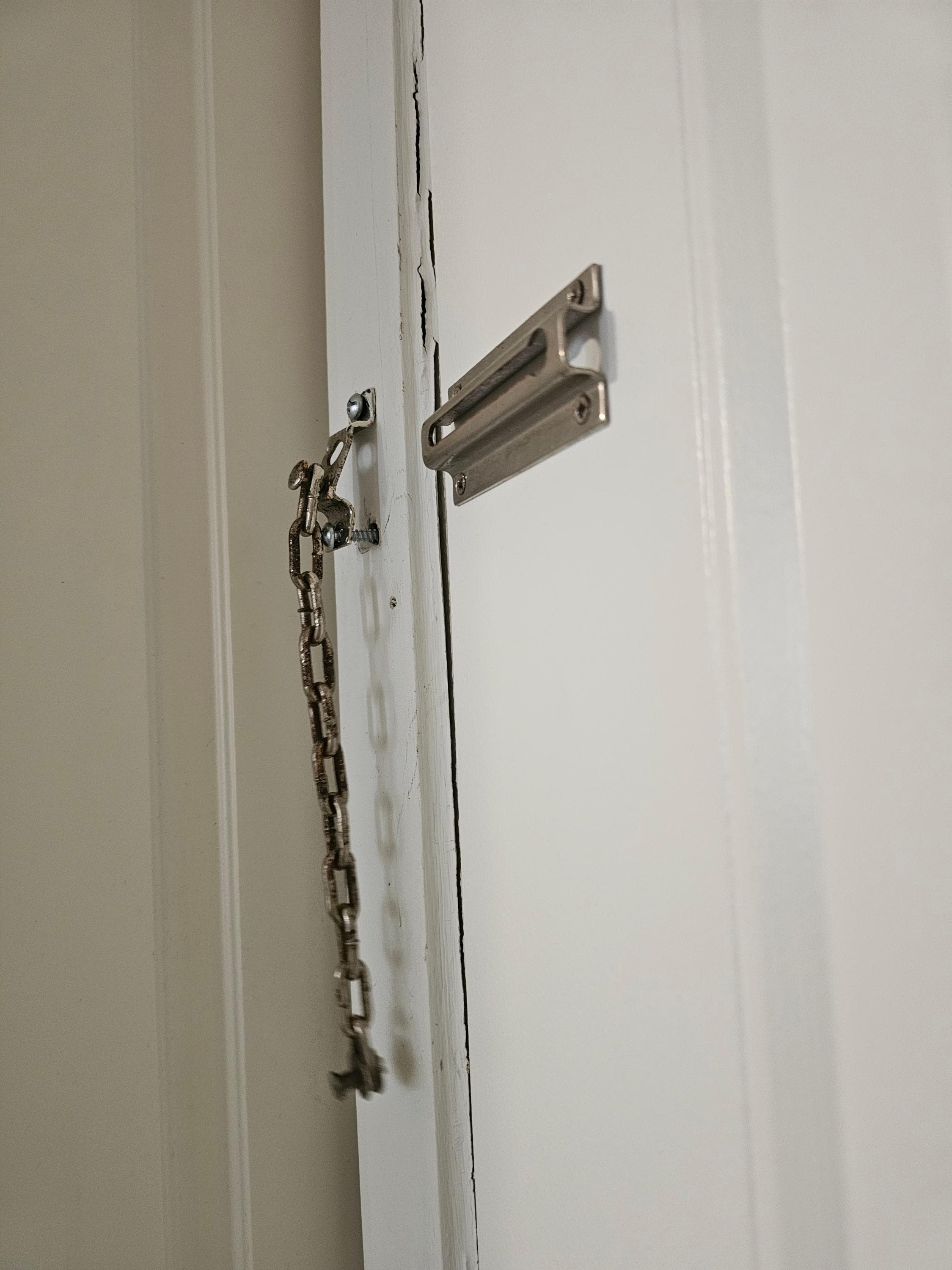 Front door latch in need of repair.