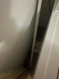 Basement area where washer and dryer are located.