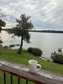 Morning coffee from the deck, also looking down toward the beach and a glimpse of the dock to the right