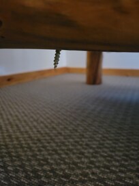 POINTED end of screw protruding from bunk bed. Ended up injuring our grandchild.