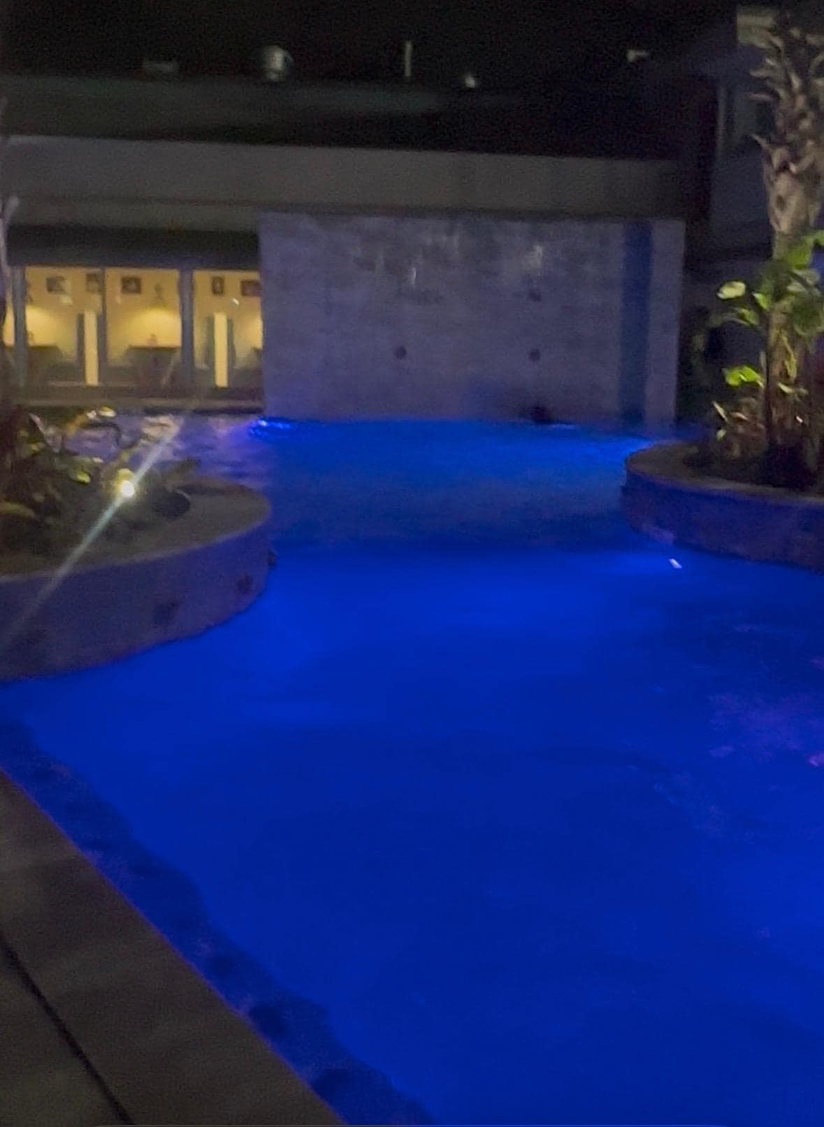 Pool Area with a Hot Tub, Outside Bar and Restaurant .