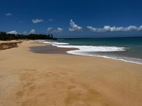 Beach in front of pool