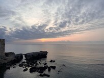 At the corner from the hotel, while waiting for a taxi.