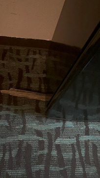 Stick holding up fridge