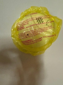 Alarm on the wall with a cover that clearly states "alarm will not work when covered"