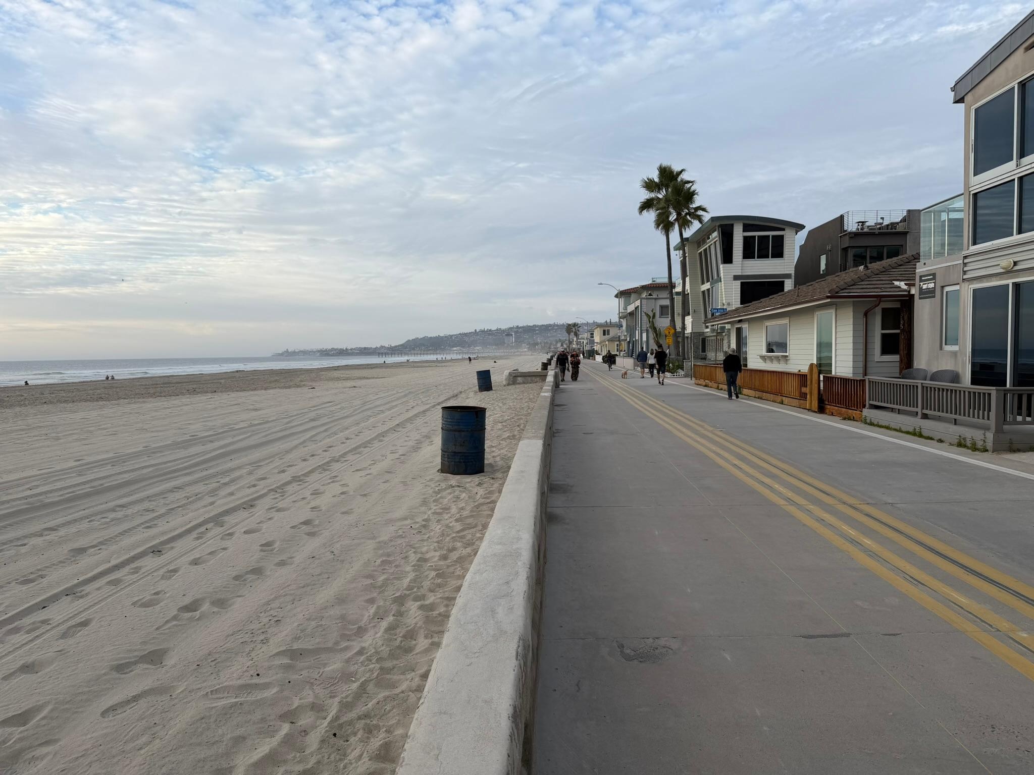 Boardwalk and beach directly in front of the alley.