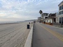 Boardwalk and beach directly in front of the alley.