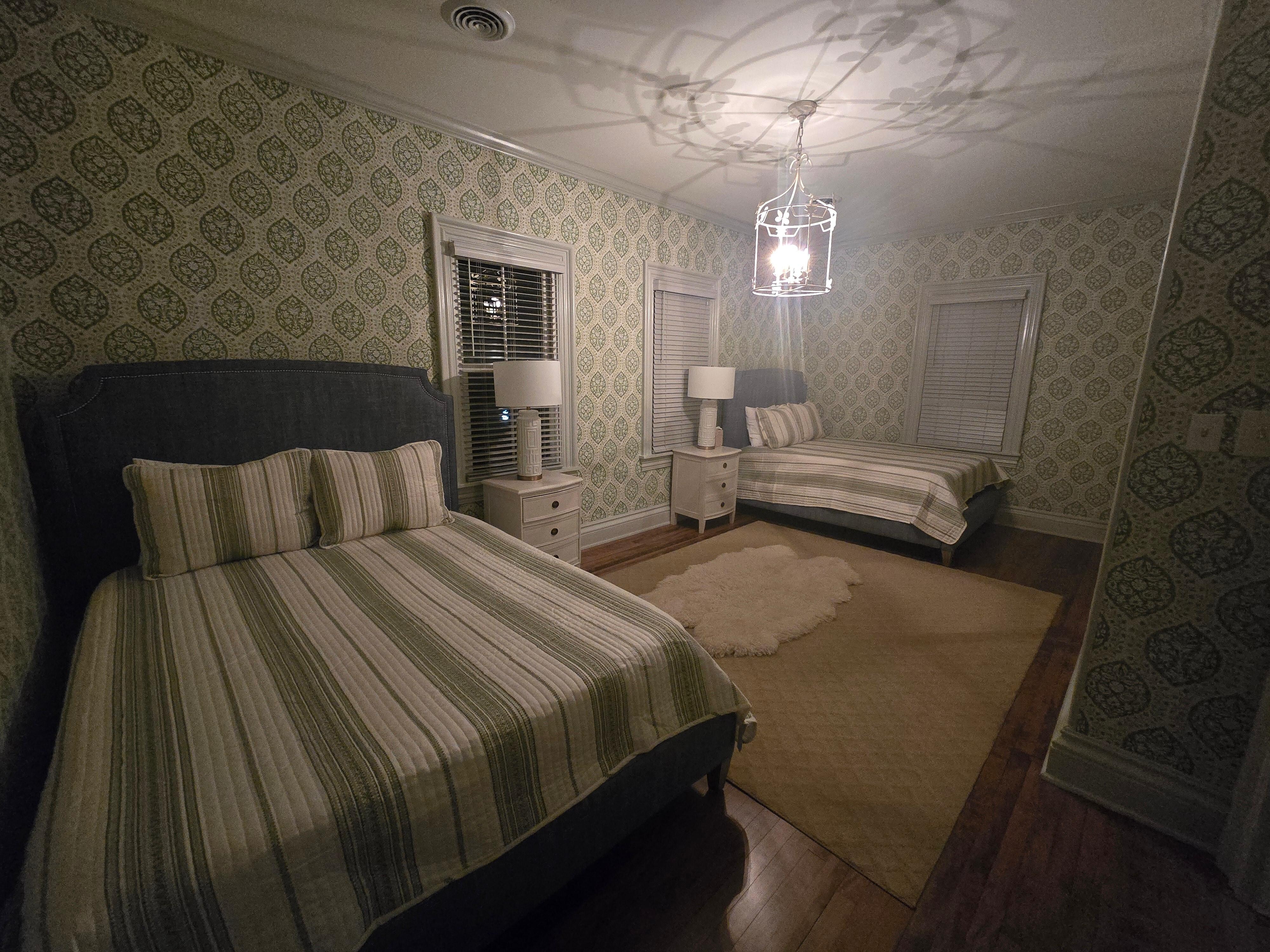 Room large enought to house 2 queen beds and  space in the middle where you could get a third queen!