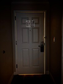 The door is not even fitted properly, you could see the hallway light.