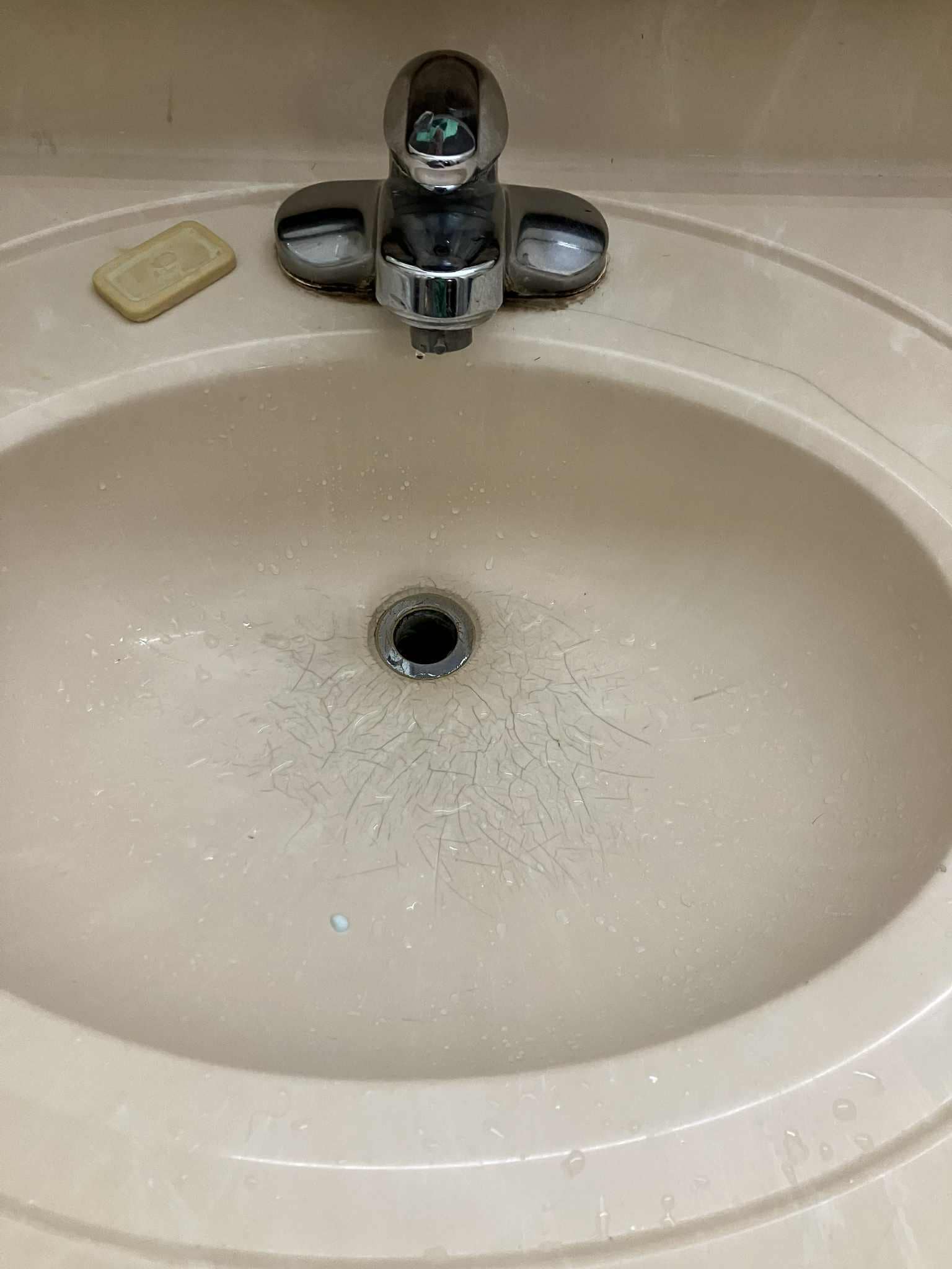 Bathroom sink cracked.