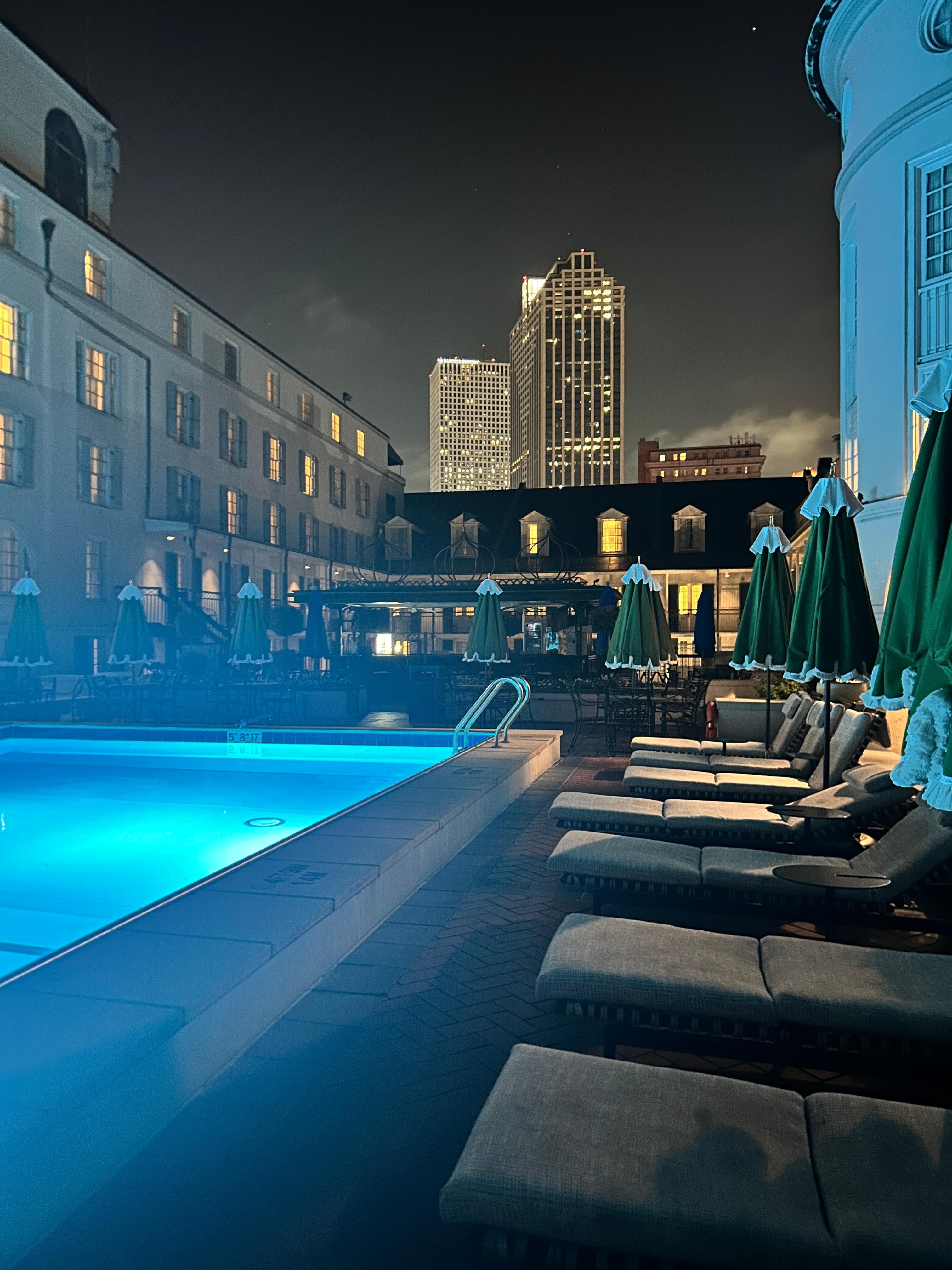 By the pool at nignt( you can’t swim after certain hrs but it’s relaxing and quiet to just sit. 